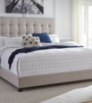 Signature Design by Ashley Dolante Queen Upholstered Bed with Chest of Drawers