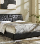 Signature Design by Ashley Beckilore King Upholstered Storage Bed-Black