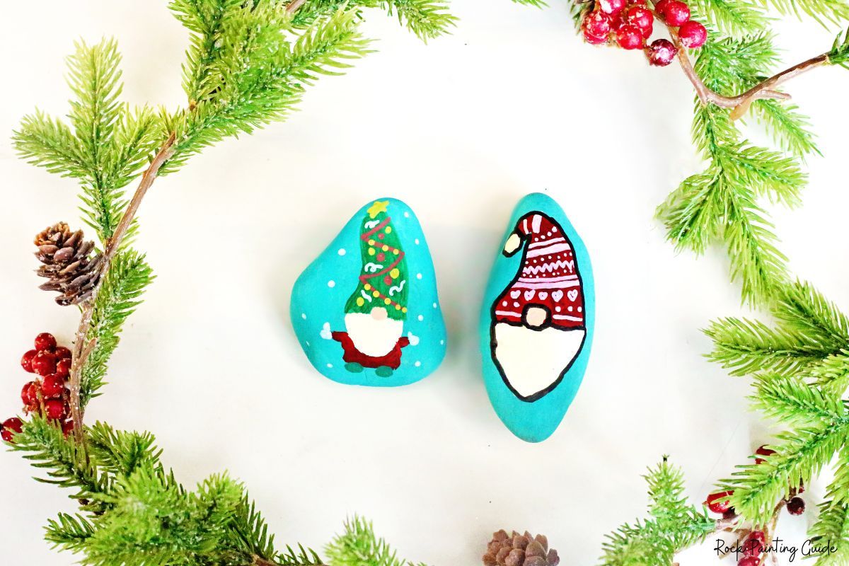 How To Make Adorable Christmas Gnome Painted Rocks 13 Christmas gnome painted rocks display with a garland