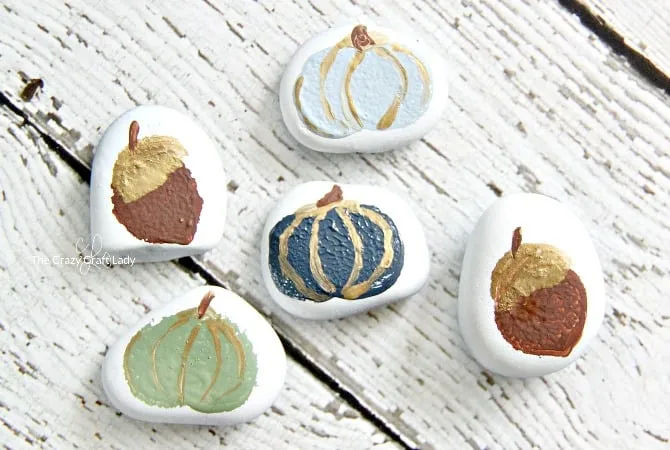 40 Cozy Autumn Rock Painting Ideas to Fall In Love With 6 Acorn and Pumpkin Painted Rocks