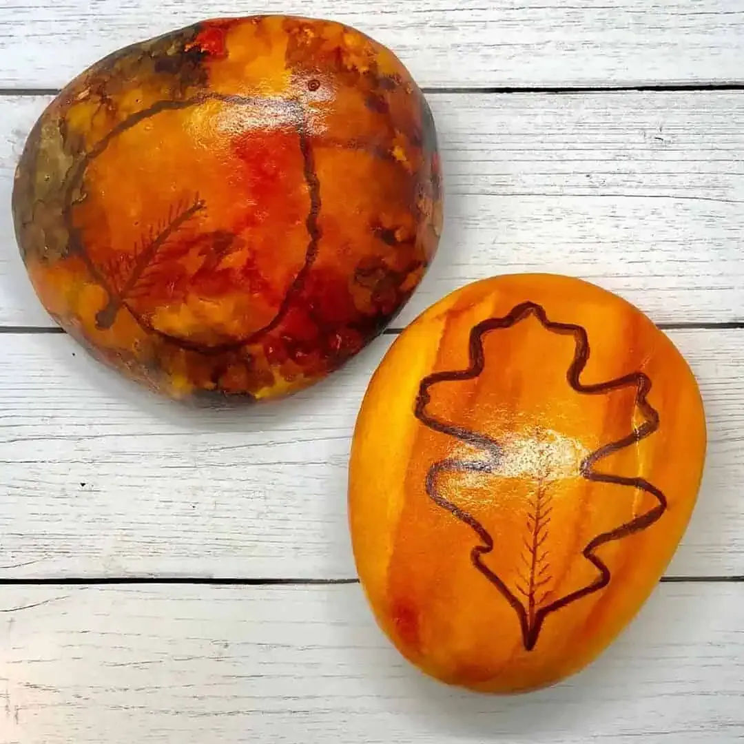 40 Cozy Autumn Rock Painting Ideas to Fall In Love With 40 leaf painted rocks