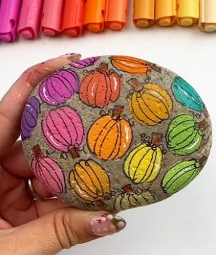 40 Cozy Autumn Rock Painting Ideas to Fall In Love With 14 colorful pumpkins painted rock