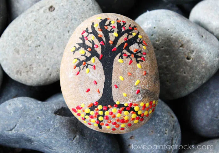 40 Cozy Autumn Rock Painting Ideas to Fall In Love With 4 autumn tree with falling leaves