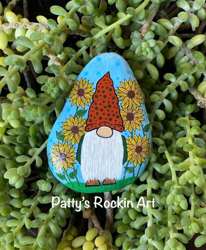 40 Cozy Autumn Rock Painting Ideas to Fall In Love With 24 sunflower gnome painted rock