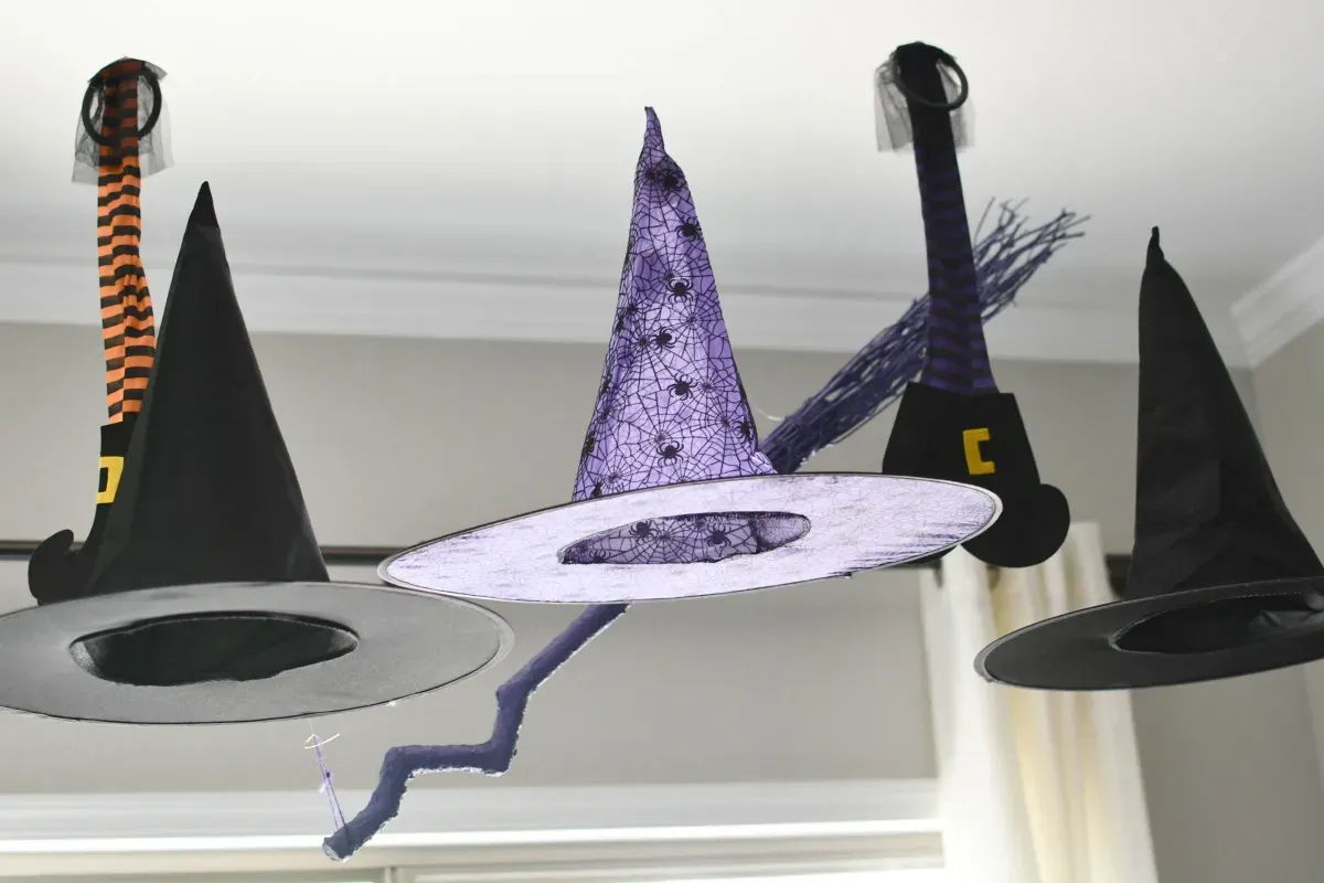 35 Glorious Hocus Pocus Crafts for a Spook-tacular Halloween 19 floating witch hats