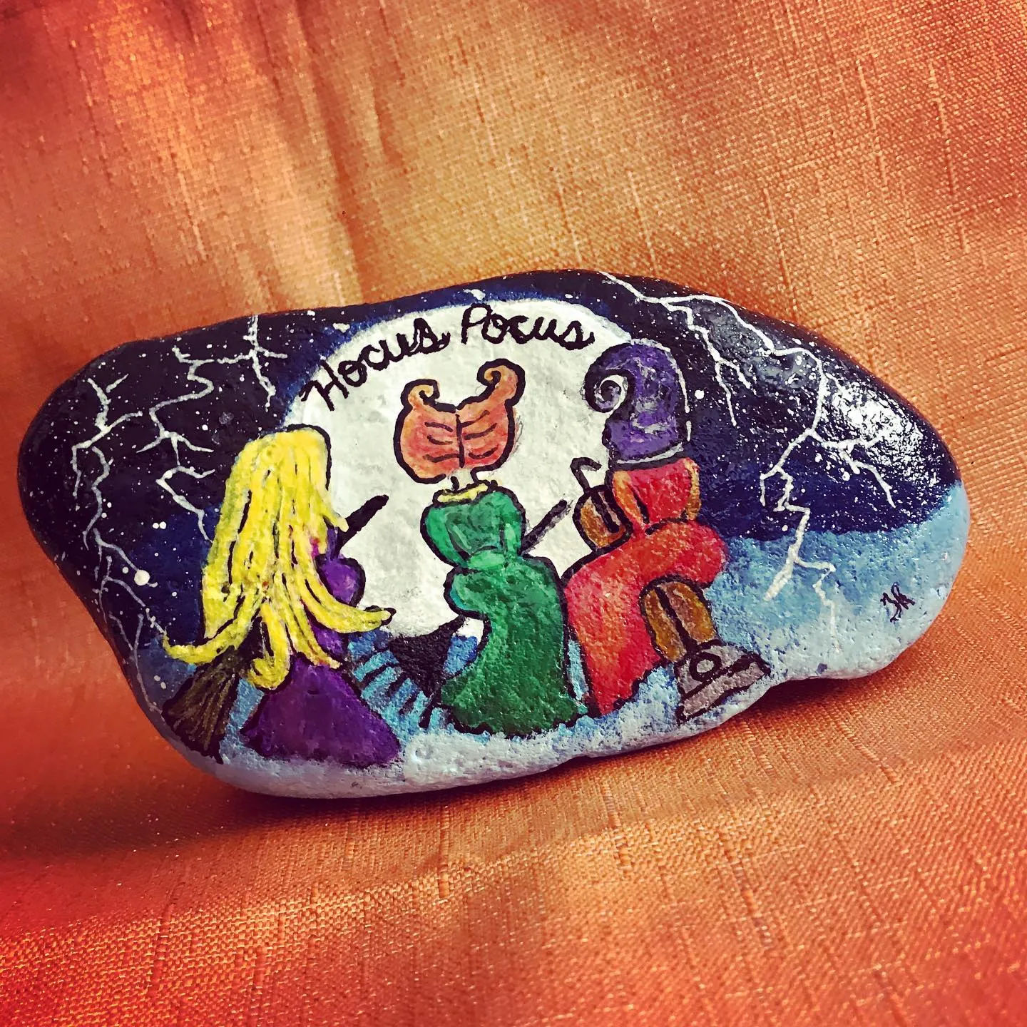 35 Glorious Hocus Pocus Crafts for a Spook-tacular Halloween 31 hocus pocus painted rock