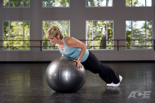 Exercise ball workout for chest and triceps