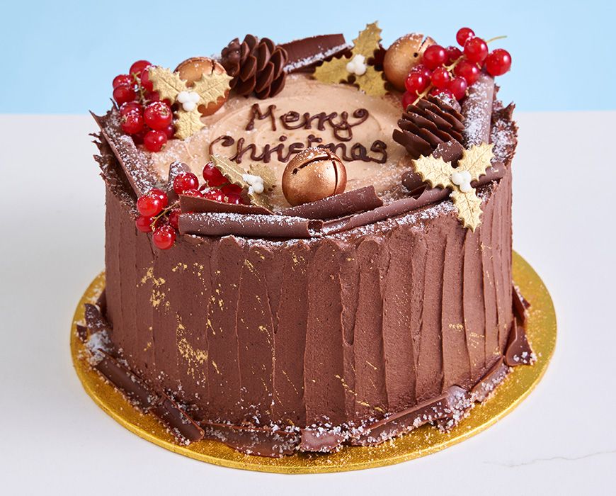 https://ik.imagekit.io/0bods5tu3//Photos/Ordering1/1896/Christmas%20Yule%20Cake1.jpg?Version=