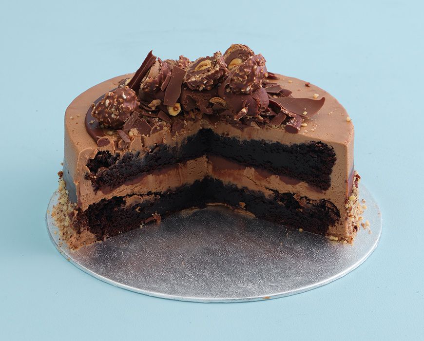 Chocolate Hazelnut Cake with Gianduja Praline Swiss Meringue Buttercream —  Butter and Brioche