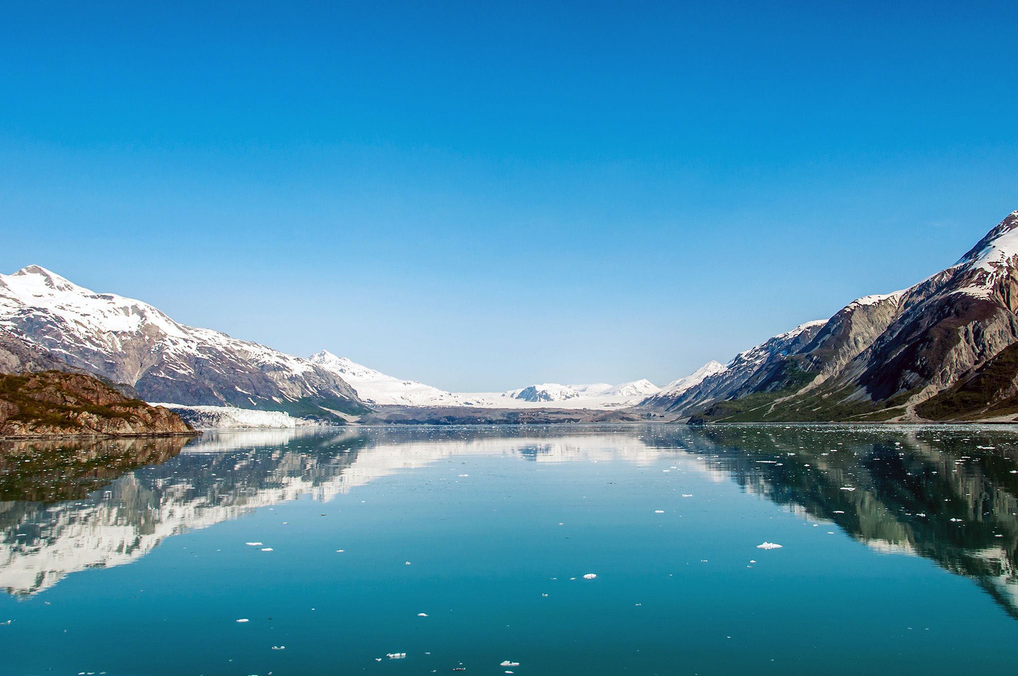 Mountains reflecting in still water, Glacier Bay National Park, Alaska, United States