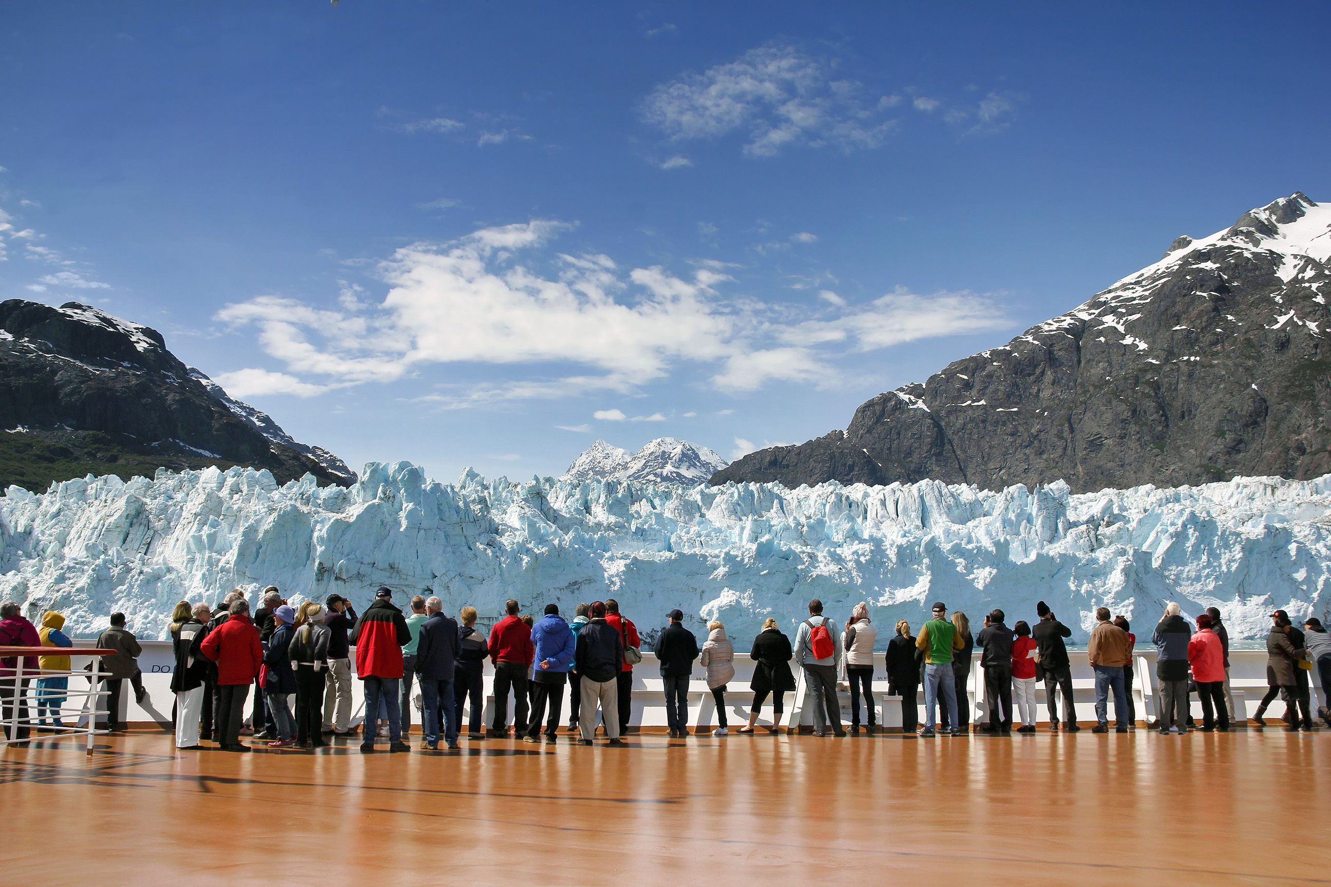Cruise passengers watching glacier in Alaska