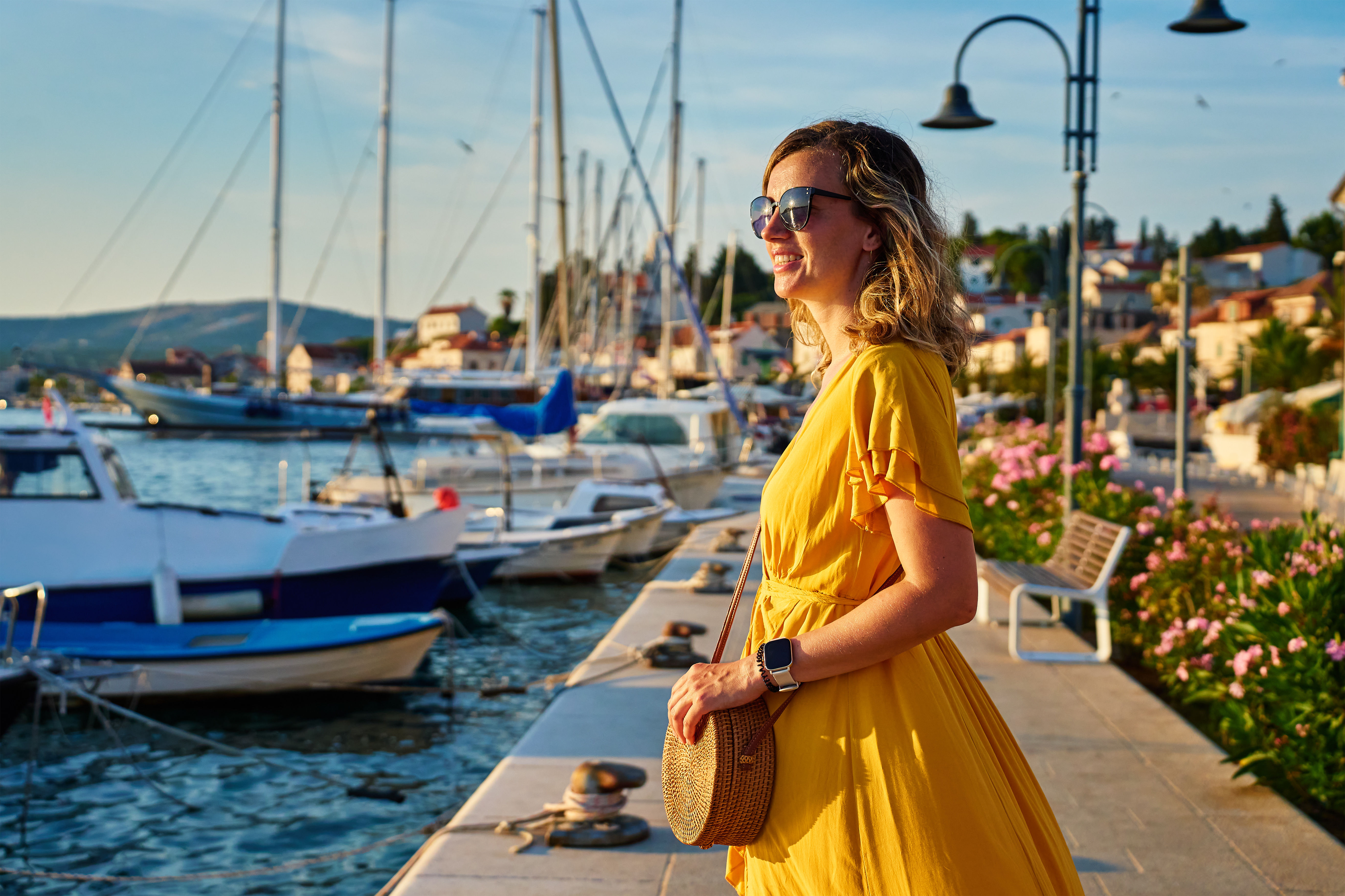 Woman on the harbor in Dubrovnik