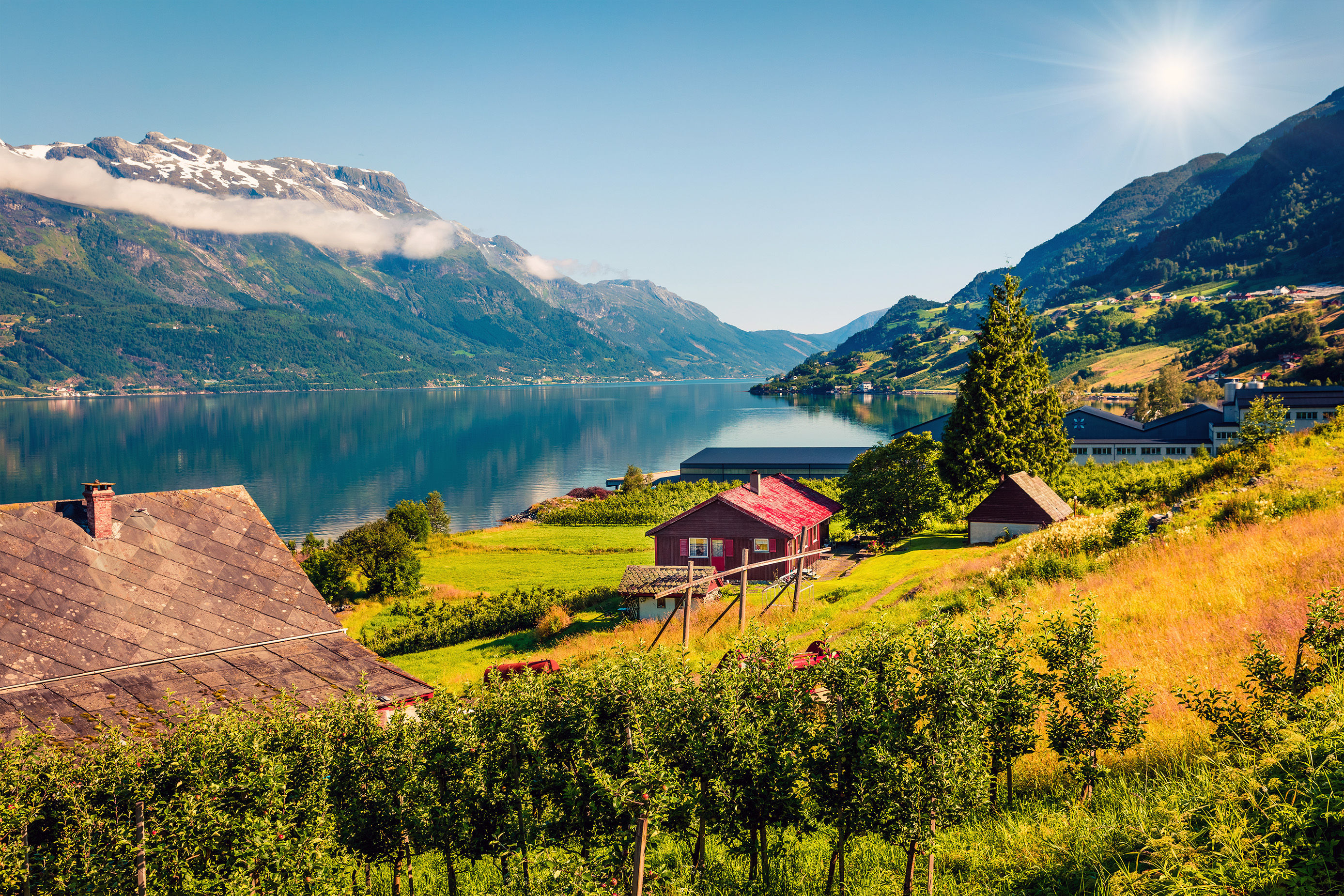 Great morning view of Hardangerfjord fjord.