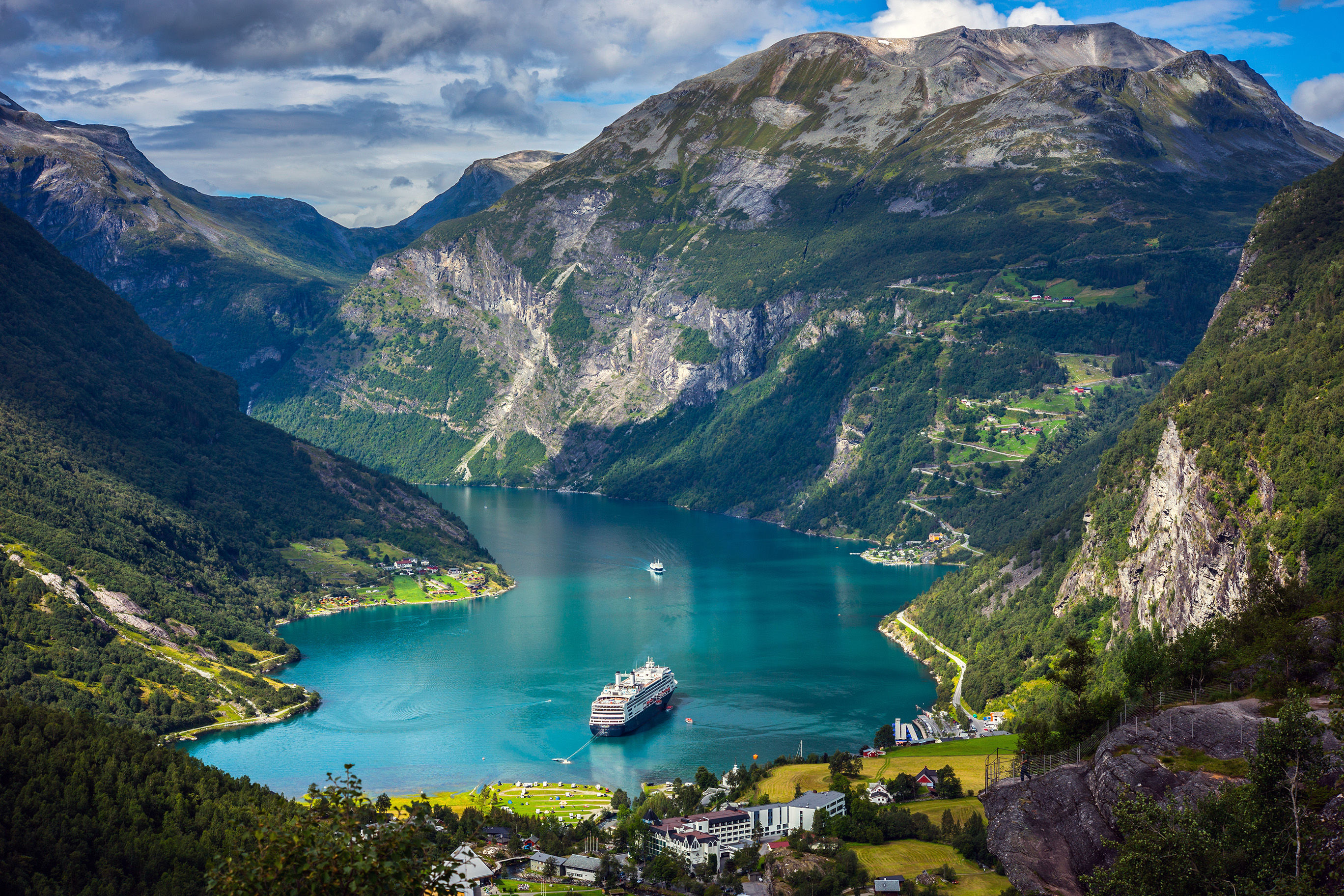 Cruise ships in the harbor of the Geiranger fjord, Norway