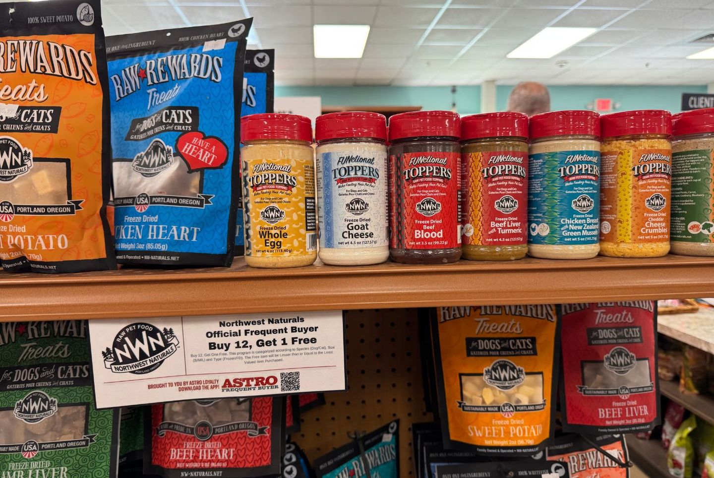 JM Pet Resort & Veterinary Clinic's retail store display of Northwest Naturals FUNctional Toppers for dogs and cats.