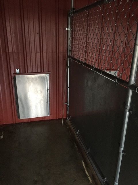 Indoor outdoor run boarding area
