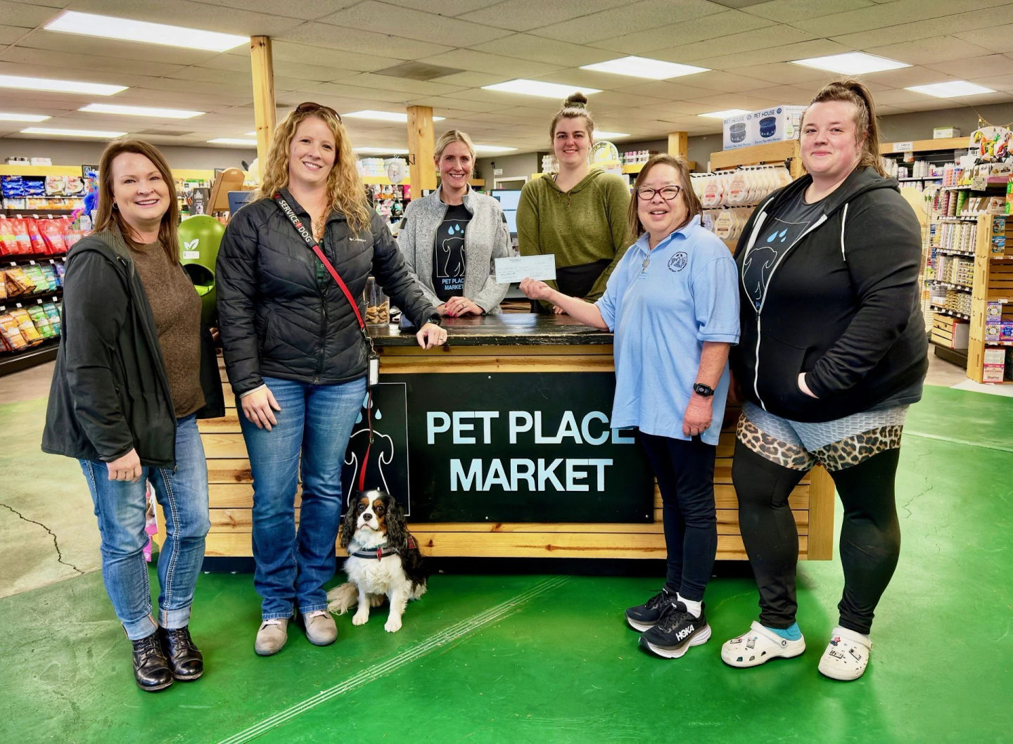 Huxley & Kent and Pet Place Market present Valley Animal Partners with a $1000 donation!