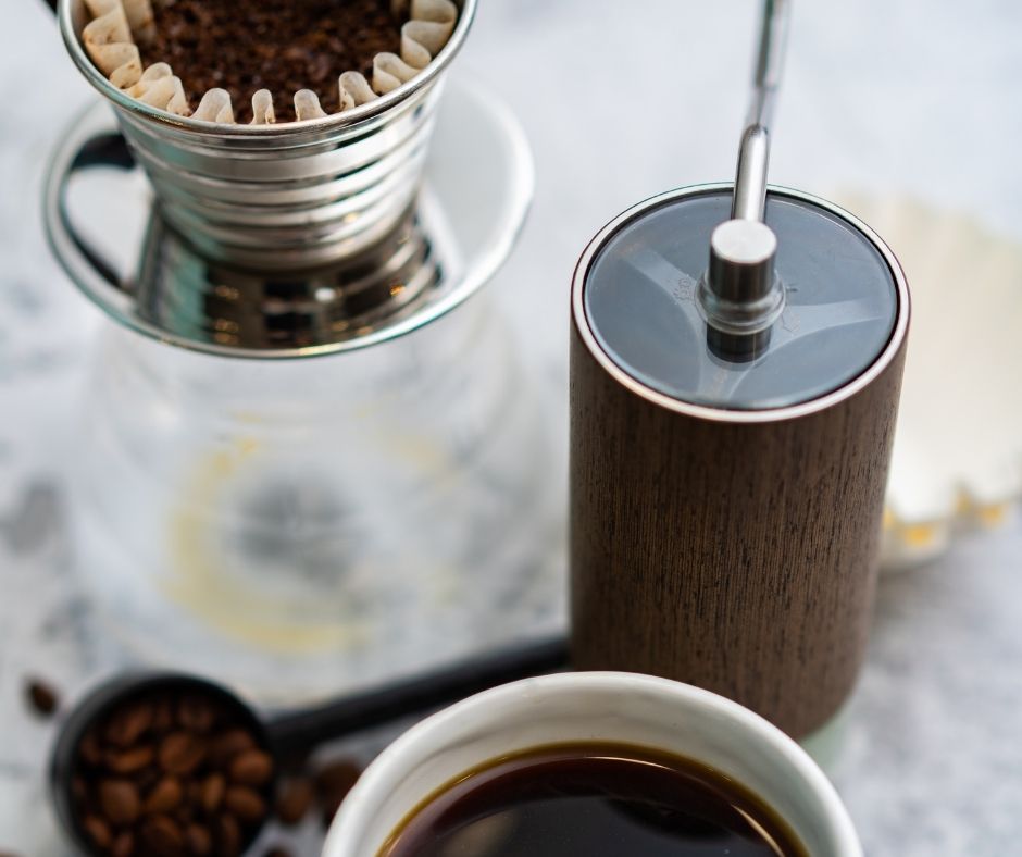 Coffee Beans Inside Shot Glass On Weight Scale With Empty Coffee