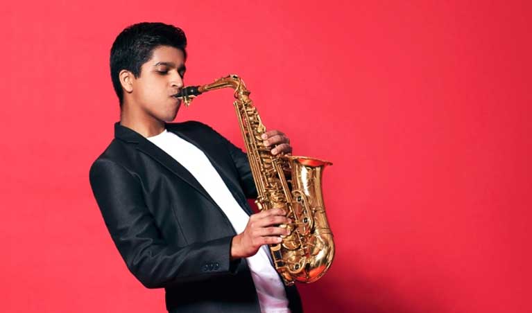 Saxophonist & flutist — book artists for corporate offsites