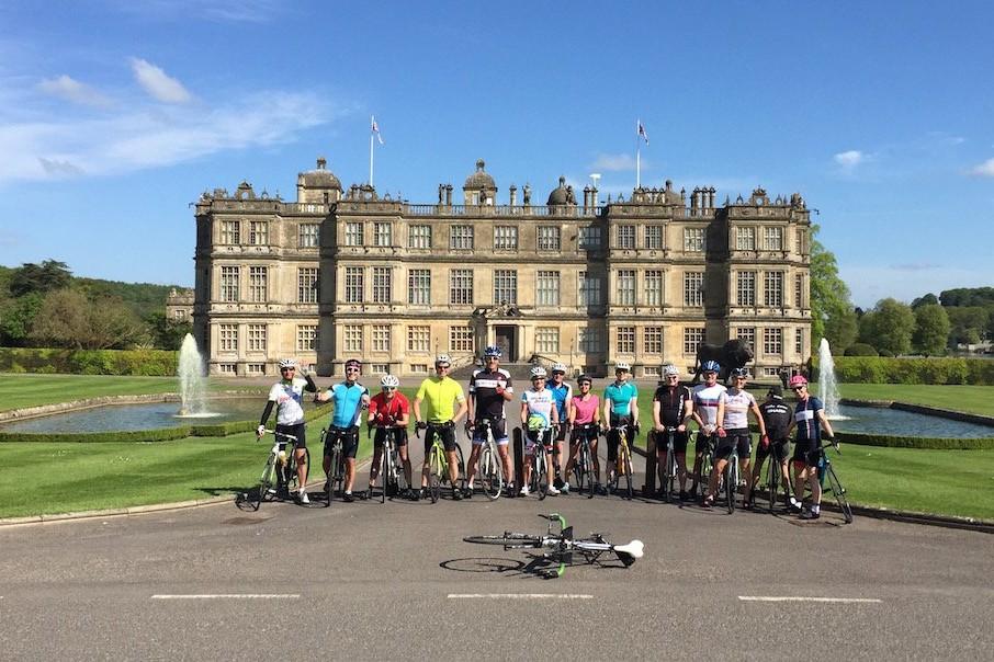 Road cycling maps - group of cyclists in front of Longleat House