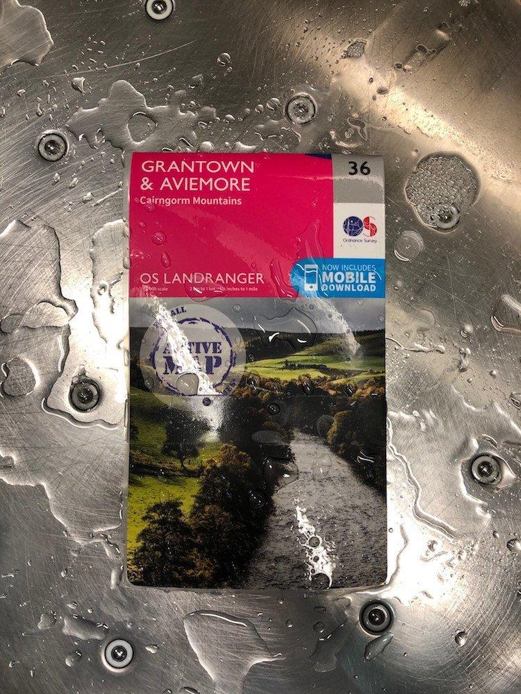 Encapsulated maps with film cover