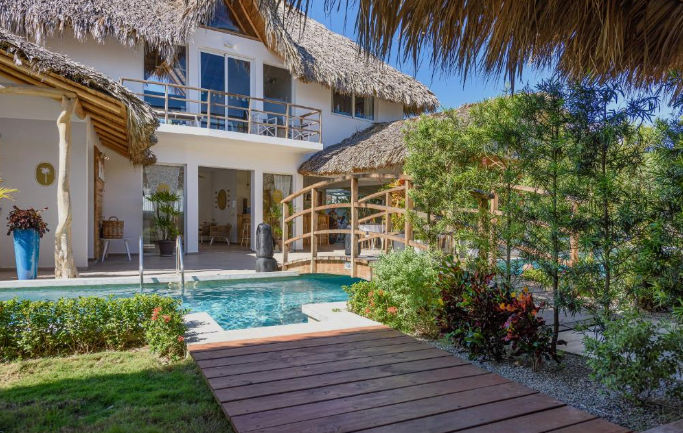 Tropical facade of Takuma Boutik Hotel in Las Terrenas