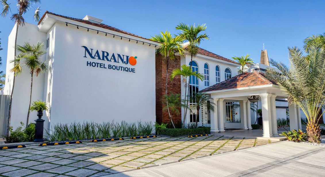 ain facade and entrance of Naranjo Hotel Boutique in Higuey Dominican Republic