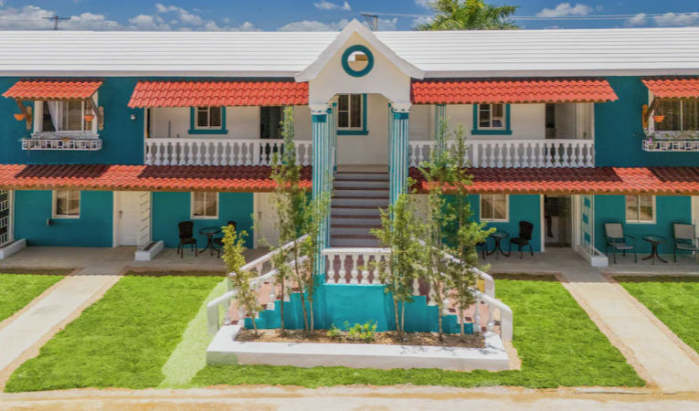 Exterior facade and main entrance of The Patio boutique hotel in Punta Cana