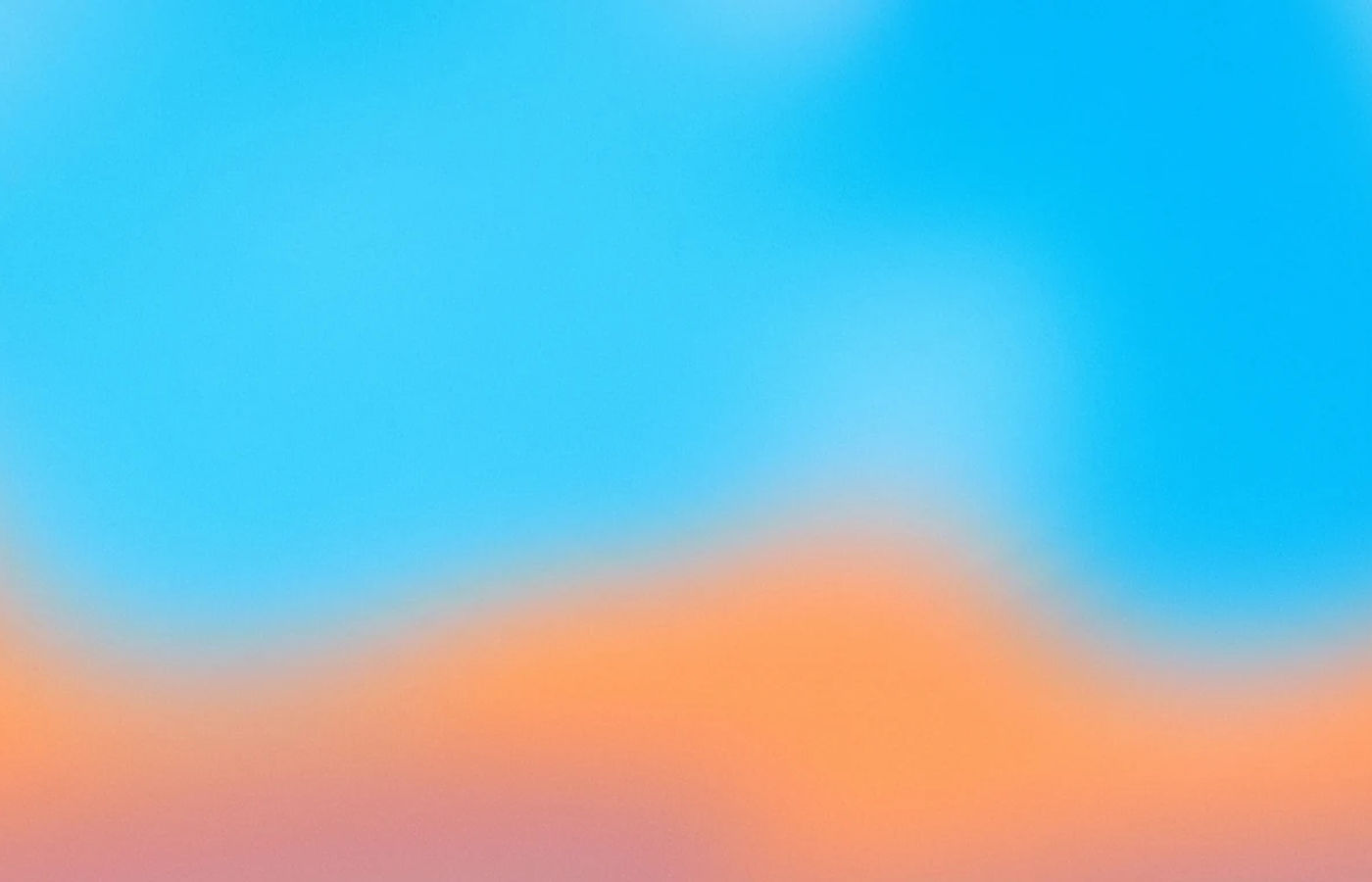 Sky blue and peach heavily blurred color fields with fine grain
