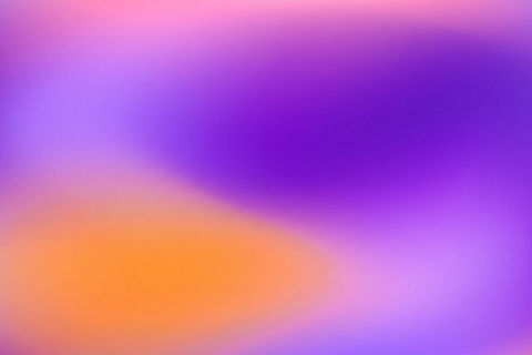 Violet and tangerine heavily blurred color fields with fine grain