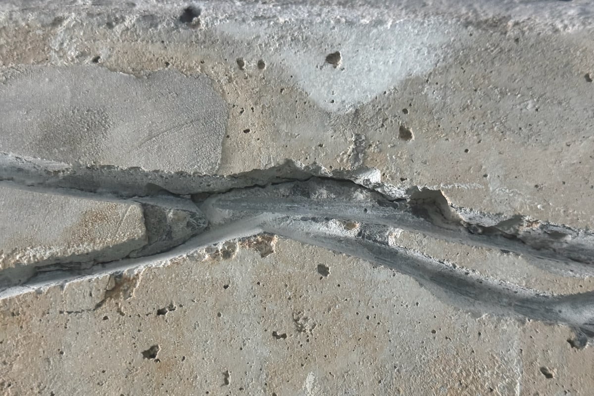 Restored structural wall with upgraded expansion joints