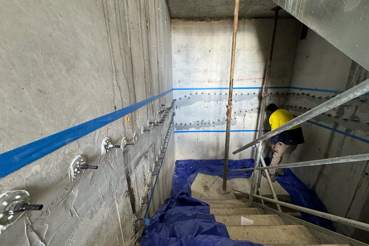 Helical bar installation within existing mortar joints