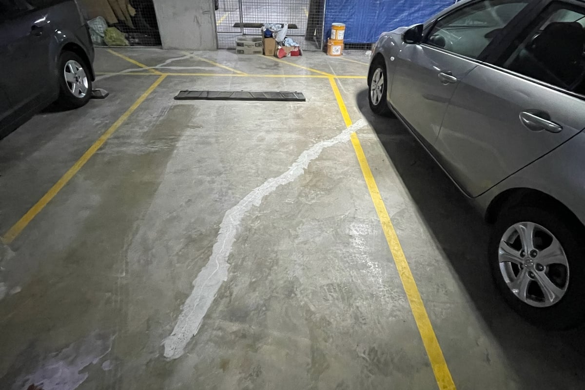 Hydraulic pier installation beneath foundation