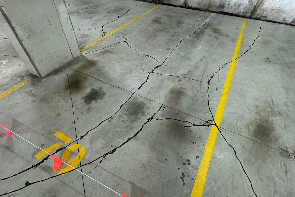 Completed slab crack injection showing permanent sealing