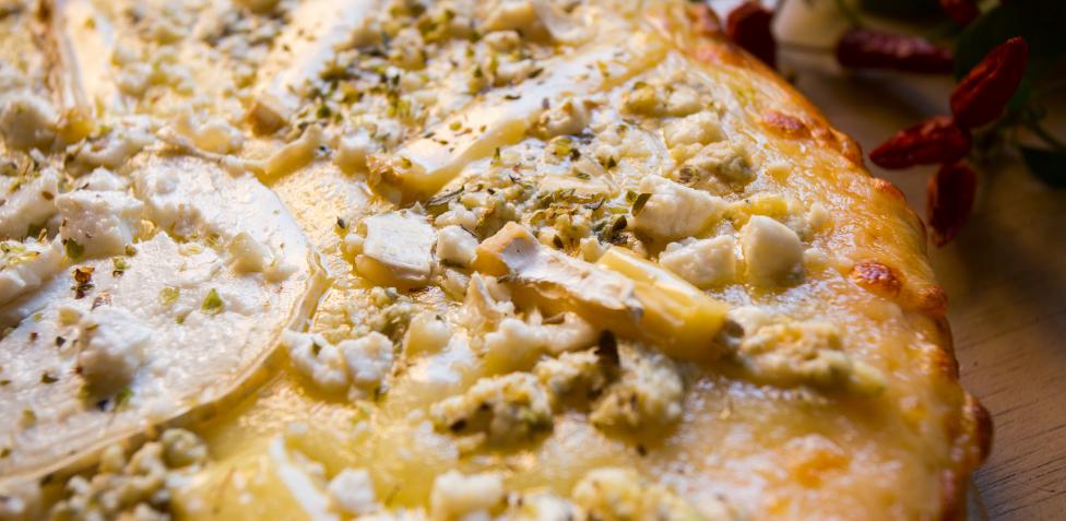 La receta más exquisita de la pizza cuatro quesos