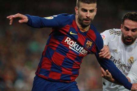 Pique y Carvajal durante un clásico