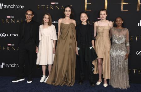 From left, Maddox Jolie-Pitt, Vivienne Jolie-Pitt, Angelina Jolie, Knox Jolie-Pitt, Shiloh Jolie-Pitt, and Zahara Jolie-Pitt arrive at the premiere of 