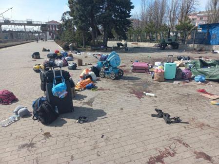 In this photo published on Ukrainian President Volodymyr Zelenskyy's Telegram channel, blood stains are seen among bags and a baby carriage on a platform after Russian shelling at the railway station in Kramatorsk, Ukraine, Friday, April 8, 2022. (Ukrainian President Volodymyr Zelenskyy's Telegram channel via