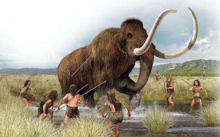Un grupo de humanos prehistóricos trata de cazar a un mamut