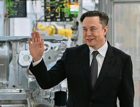 FILE - Tesla CEO Elon Musk attends the opening of the Tesla factory Berlin Brandenburg in Gruenheide, Germany, Tuesday, March 22, 2022. Shares of Tesla and Twitter have tumbled this week as investors deal with the fallout and potential legal issues surrounding Tesla CEO Musk and his $44 billion bid to buy the social media platform. Of the two, Musk's electric vehicle company has fared worse, with its stock down almost 16% so far this week to $728. (Patrick Pleul/Pool via AP, File)