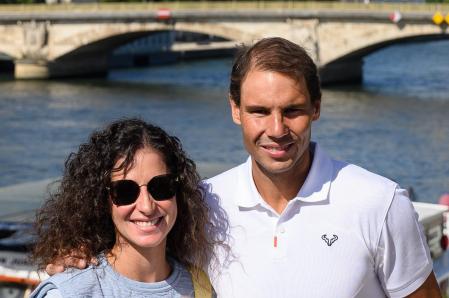 Rafael Nadal and  Xisca Perello posing with the Roland Garros tournament cup Rafael Nadal in Paris on June 6, 2022.