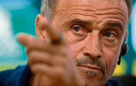 Spain's coach Luis Enrique gestures as he gives a press conference on the eve of the UEFA Nations League football match between Portugal and Spain, at the Municipal Stadium in Braga on September 26, 2022. (Photo by MIGUEL RIOPA / AFP)
