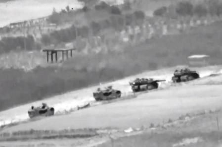In this undated image taken from video released by Israeli Defense Forces, a line of Israeli tanks are shown during an incursion into the Gaza Strip