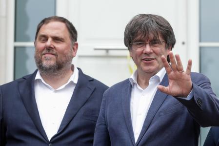 El líder de ERC, Oriol Junqueras, y el expresident catalán Carles Puigdemont