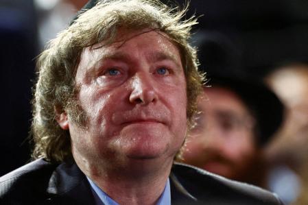 FILE PHOTO: Argentina's President Javier Milei looks on as he attends a Hanukkah celebration in Buenos Aires, Argentina, December 12, 2023. REUTERS/Tomas Cuesta//File Photo/File Photo