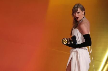 Taylor Swift accepts the award for Best Pop Vocal Album for Midnights during the 66th Annual Grammy Awards in Los Angeles, California, U.S., February 4, 2024. REUTERS/Mike Blake TPX IMAGES OF THE DAY