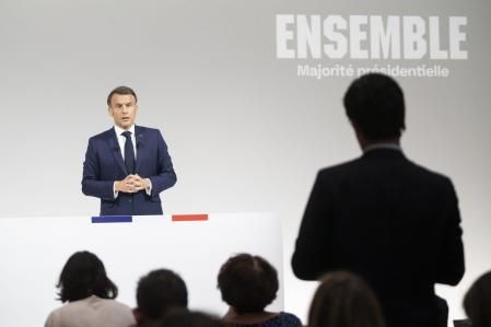 Emmanuel Macron, France's president, takes a question from the audience during a news conference in Paris, France, on Wednesday, June 12, 2024. Macronsaid he won#{emoji}146;t resign if his party suffers a poor result in the snap parliamentary election he called on Sunday. Photographer: Nathan Laine/Bloomberg
