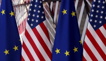 (FILES) This photograph shows flags prior to an EU-US summit at European Union headquarters in Brussels on June 15, 2021. France's Prime Minister Francois Bayrou said on January 20, 2025, that France and Europe risk being dominated, crushed and marginalised if they do nothing to counter the policies of Donald Trump, ahead of his inauguration as US president. (Photo by Kenzo Tribouillard / AFP)