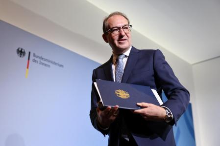 German Interior Minister Alexander Dobrindt leaves after speaking to members of the media following the weekly cabinet meeting in Berlin, Germany, October 8, 2025. REUTERS/Nadja Wohlleben