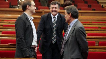 Puigcercós, Herrera y Mas hablan durante uno de los descansos del debate de investidura